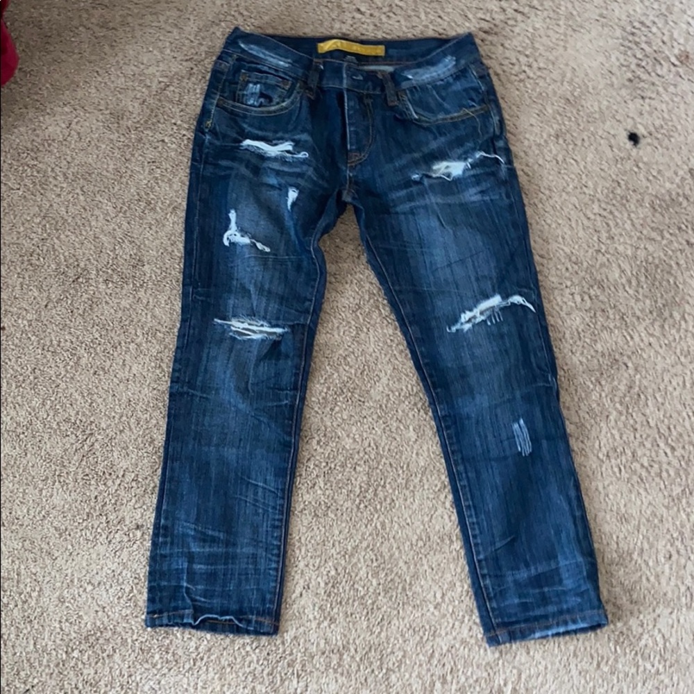 Dark wash low rise ripped jeans